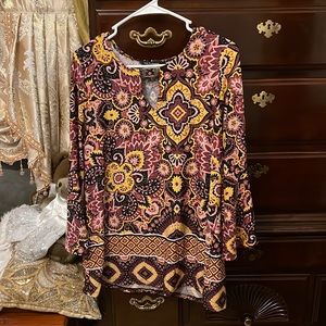 Beautiful top for work or church. Bought from a boutique.